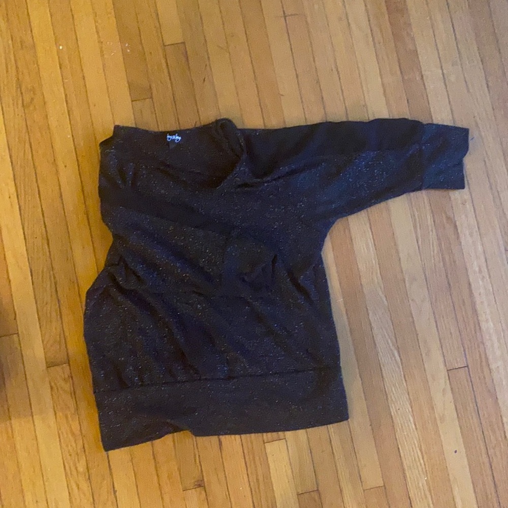 Very cute black with silver specs gently worn blouse